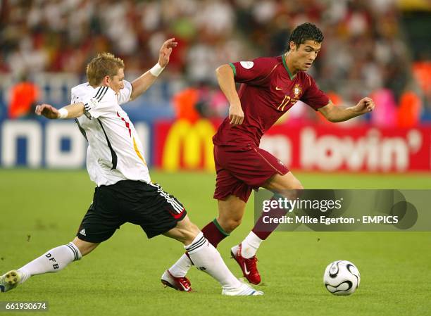 Germany's Bastian Schweinsteiger fouls Portugal's Cristiano Ronaldo