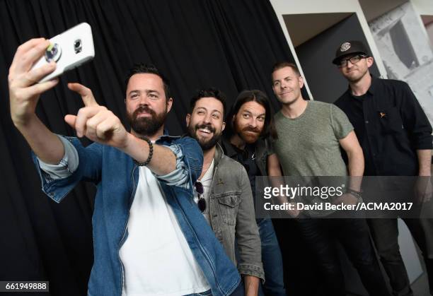 Musicians Brad Tursi, Matthew Ramsey, Geoff Sprung, Trevor Rosen, and Whit Sellers of Old Dominion pose for a selfie during the 52nd Academy Of...