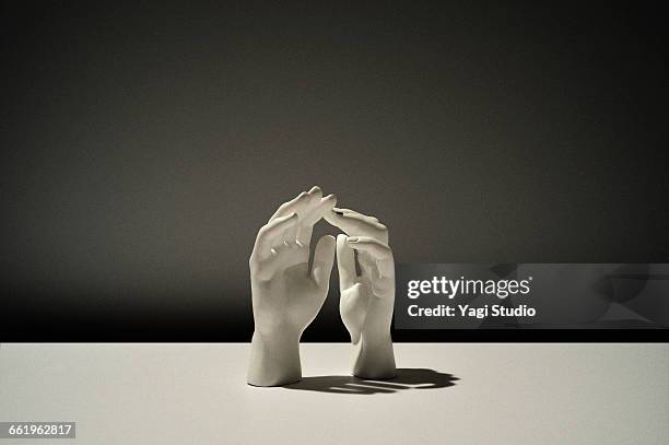 conceptual image / white hand of sculpture - scultura fotografías e imágenes de stock