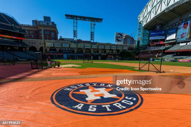 Houston Astros logo mat on the field for batting practice before the start of an MLB spring training game between the Houston Astros and the Chicago...