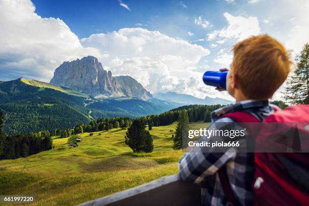 adventures on the dolomites: boy drinking water - water canteen stock pictures, royalty-free photos & images