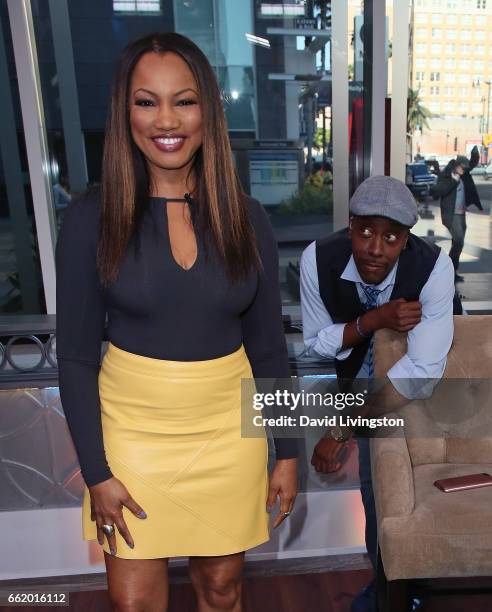 Actor Arsenio Hall photobombs actress/host Garcelle Beauvais at Hollywood Today Live at W Hollywood on March 31, 2017 in Hollywood, California.