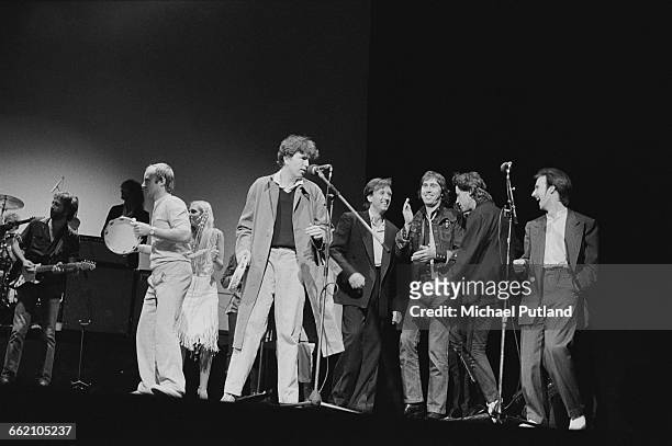 An all-star line-up performs 'I Shall Be Released' at the finale of 'The Secret Policeman's Other Ball', at the Drury Lane theatre, London, 9th...