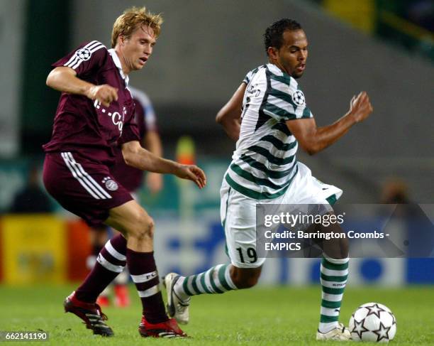 Bayern Munich's Andreas Ottl follows Sporting Lisbon's Alecsandro