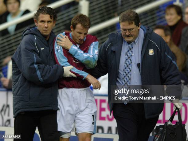 West Ham United's Lee Bowyer is taken off after dislocating his shoulder