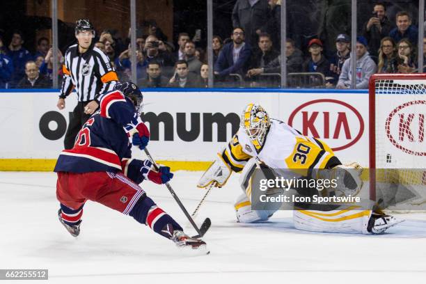 Pittsburgh Penguins Goalie Matt Murray blocks a shot by New York Rangers Right Wing Mats Zuccarello in the shoot out of a Metropolitan Divisional...