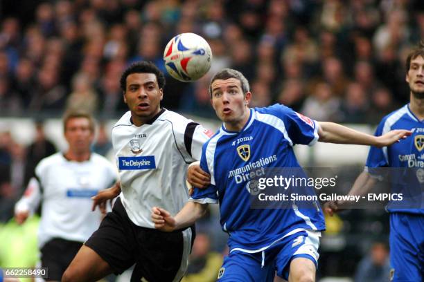 Derby County's Giles Barnes and Cardiff City's Kevin McNaughton in action