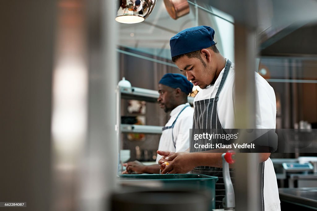 Chef Issuing Stock Chefs Preparing Commodities In Kitchen High-Res Stock Photo - Getty Images