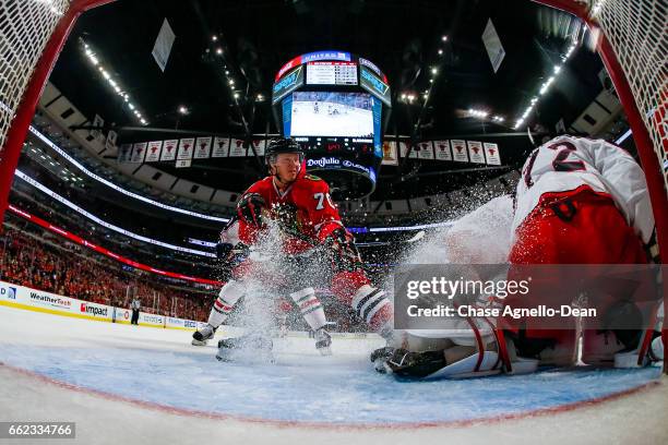 Dennis Rasmussen of the Chicago Blackhawks sprays goalie Sergei Bobrovsky of the Columbus Blue Jackets in the second period at the United Center on...