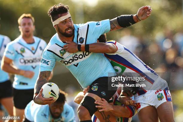 Andrew Fifita of the Sharks is tackled during the round five NRL match between the Cronulla Sharks and the Newcastle Knights at Southern Cross Group...