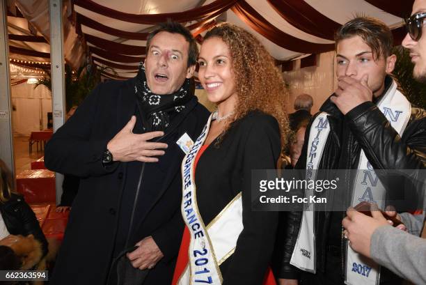 Presenter Jean Luc Reichmann and a Miss Elegance 2017 attend Foire du Trone Auction Launch Party to benefit 'Les Petits Princes' Children Care...