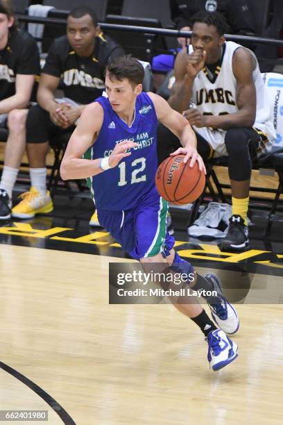 Jake Kocher of the Texas A&M-CC Islanders dribbles the ball during the Semi-final of the CollegeInsider.com Tournament against the UMBC Retrievers at...