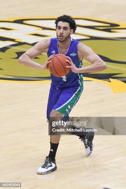 Ehab Amin of the Texas A&M-CC Islanders passes the ball during the Semi-final of the CollegeInsider.com Tournament against the UMBC Retrievers at The...