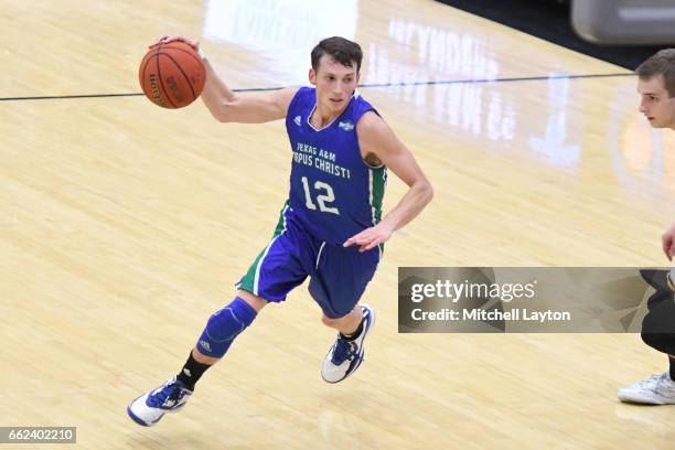 Jake Kocher of the Texas A&M-CC Islanders dribbles the ball during the Semi-final of the CollegeInsider.com Tournament against the UMBC Retrievers at...