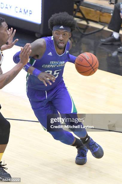 Rashawn Thomas of the Texas A&M-CC Islanders dribbles the ball during the Semi-final of the CollegeInsider.com Tournament against the UMBC Retrievers...