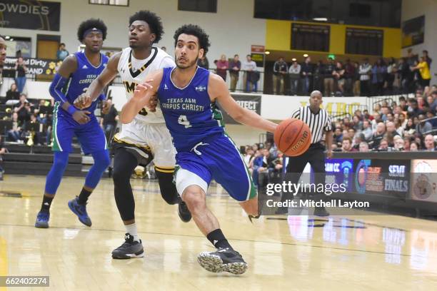 Ehab Amin of the Texas A&M-CC Islanders dribbles the ball during the Semi-final of the CollegeInsider.com Tournament against the UMBC Retrievers at...