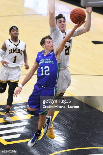 Jake Kocher of the Texas A&M-CC Islanders drives to the basket during the Semi-final of the CollegeInsider.com Tournament against the UMBC Retrievers...