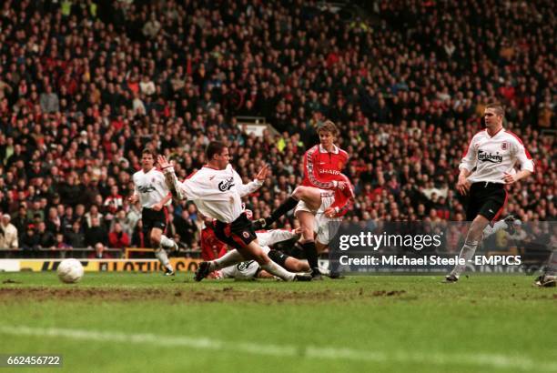 Manchester United's Ole Gunner Solskjaer's avoids Jamie Carragher to score their winning goal ... Soccer - AXA FA Cup - Fourth Round - Manchester...