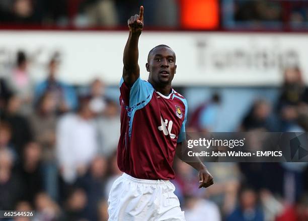 West Ham United's Carlton Cole celebrates scoring the first goal of the game.