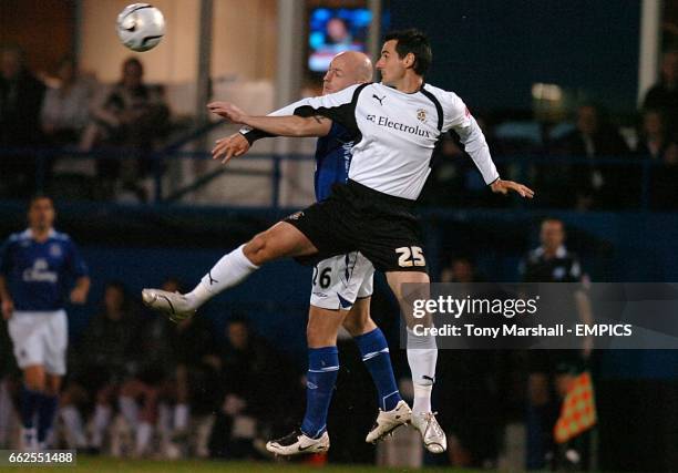 Luton Town's Matthew Spring and Everton's Lee Carsley battle for the ball.