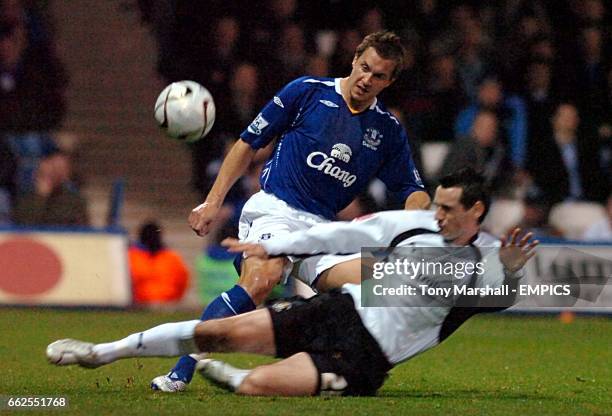 Luton Town's Matthew Spring and Everton's Phil Jagielka battle for the ball.