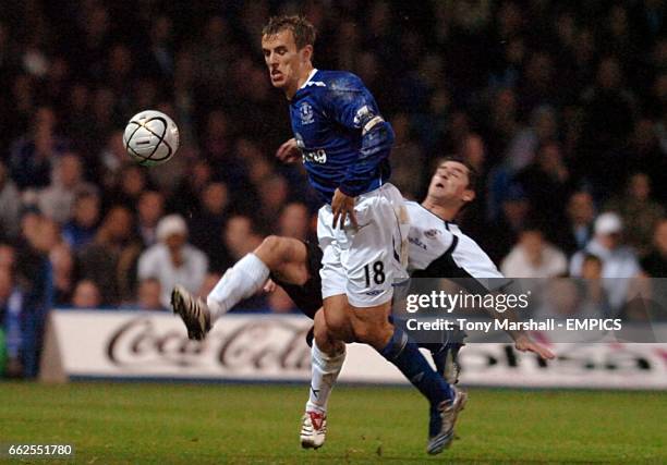 Luton Town's Steve Robinson and Everton's Phil Jagielka battle for the ball.