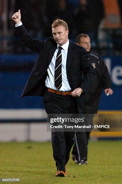 Everton manager David Moyes celebrates victory after the final whistle.