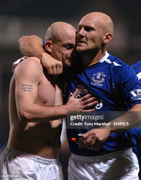 Everton's Lee Carsley and Thomas Gravesen celebrate victory after the final whistle.