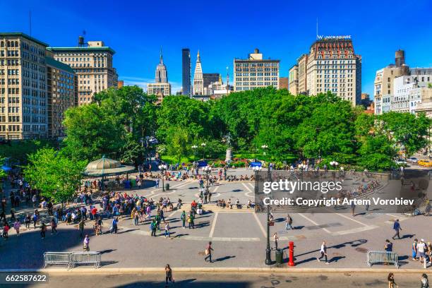 union square, new york - crowded park stock pictures, royalty-free photos & images