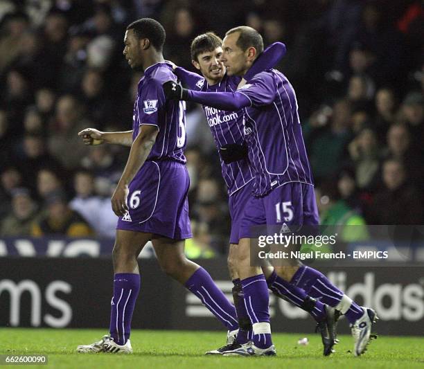 Manchester City's Daniel Sturridge is congratulated by team mates Stephen Ireland and Martin Petrov after scoring the second goal of the game.
