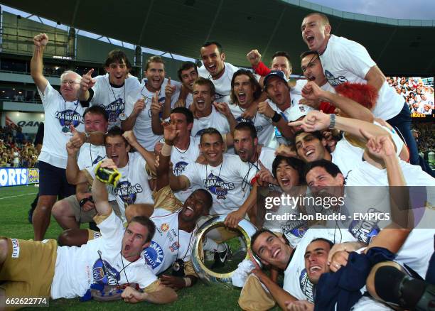 Jets celebrate with trophy during the Hyundai A-League Grand Final between Central Coast Mariners and Newcastle United Jets at Sydney Football Stadium