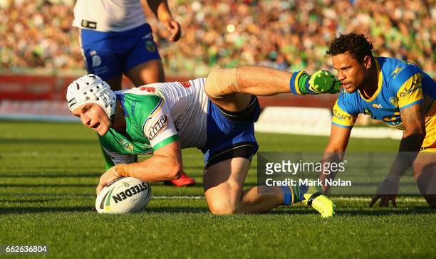 Jarrod Croker of the Raiders scores his 100th try during the round five NRL match between the Canberra Raiders and the Parramatta Eels at GIO Stadium...