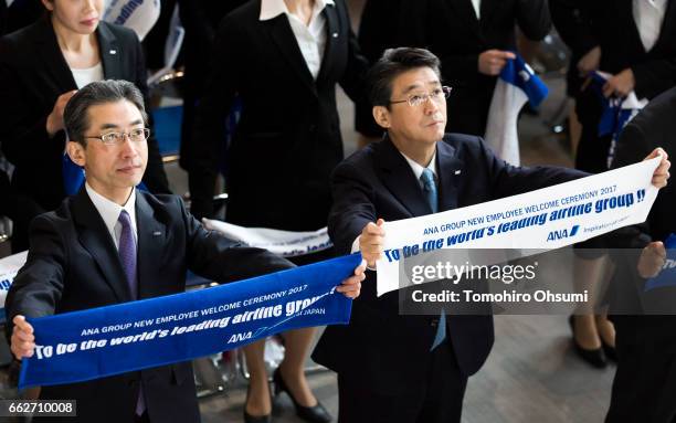 All Nippon Airways Co. President and Chief Executive Office Yuji Hirako, left, and ANA Holdings Inc. President and Chief Executive Officer Shinya...