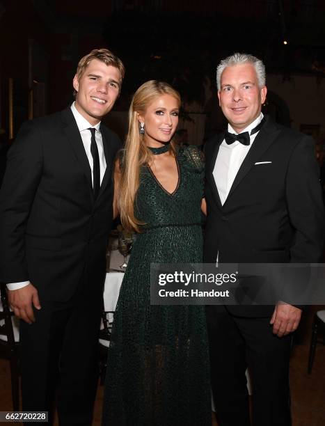 In this handout image supplied by Formula E, Chris Zylka and Paris Hilton attend a dinner hosted by the FIA Formula E Championship Mexico City ePrix...