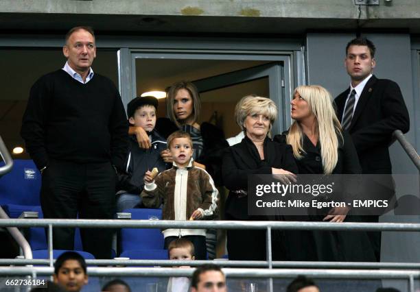 David Beckham's family including his wife Victoria, father Ted, mother Sandra, sister Joanne and son's Brooklyn, Romeo and Cruz watch his 100th...