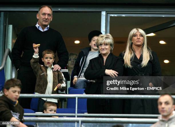 David Beckham's family including his father Ted, mother Sandra, sister Joanne and son's Brooklyn, Romeo and Cruz watch his 100th appearance for...