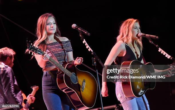 Singers Taylor Dye and Madison Marlow of Maddie & Tae perform onstage at the Bash at the Beach presented by WME at the Mandalay Bay Beach at Mandalay...