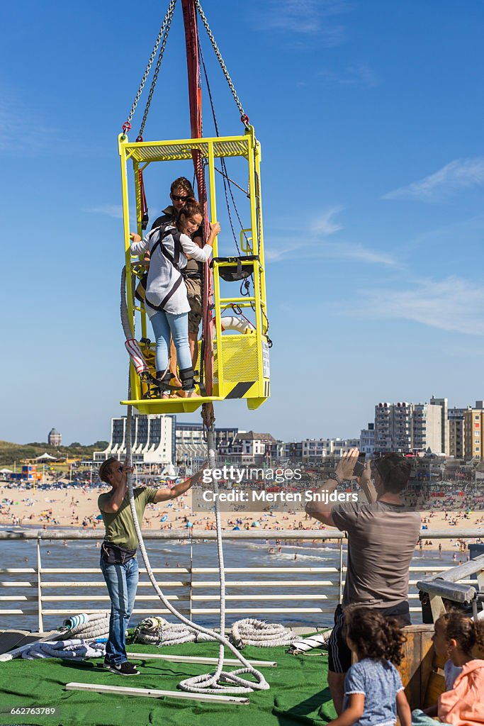 Woman Rigged For Bungeejump Hoisted Up High-Res Stock Photo - Getty Images
