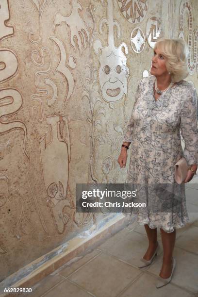 Camilla, Duchess of Cornwall visits a mural of mafia symbols at La Gloriette, a community centre based on a property which once belonged to one of...