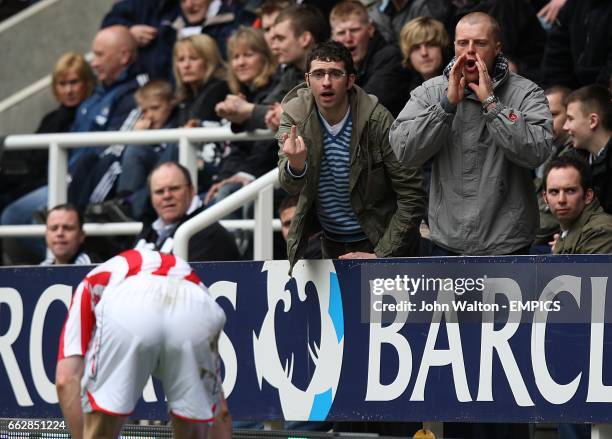 Newcastle United fans jeer Sunderland's Paul McShane as he prepares to take a throw-in.