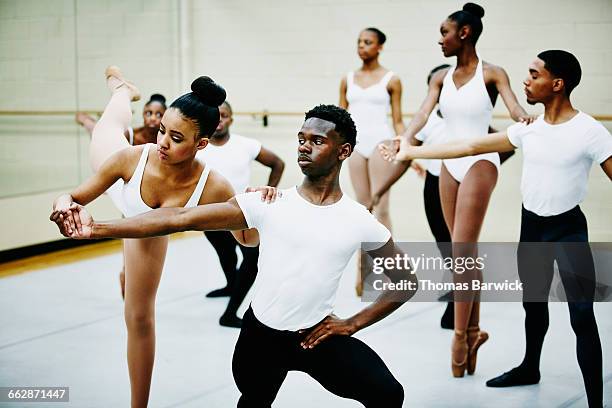 ballet partners in rehearsal in dance studio - rehearsal - fotografias e filmes do acervo