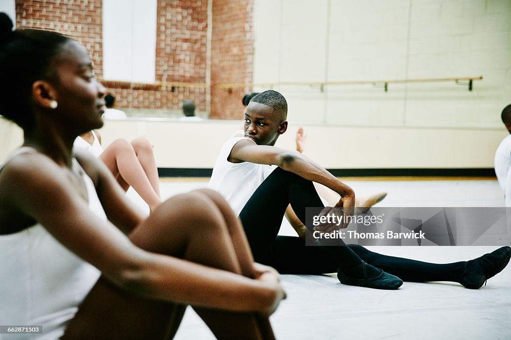 Ballet student resting during rehearsal