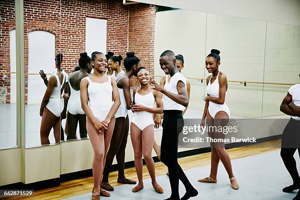 laughing group of ballet students - ballet boy foto e immagini stock