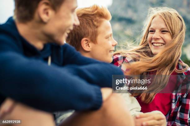 adventures on the dolomites: brothers and sister together - brother sister stock pictures, royalty-free photos & images