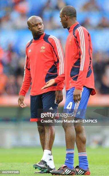 France's William Gallas talks to team mate Patrick Vieira prior to kick off