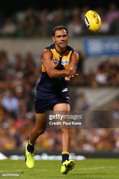 Josh Hill of the Eagles handballs during the round two AFL match between the West Coast Eagles and the St Kilda Saints at Domain Stadium on April 1,...