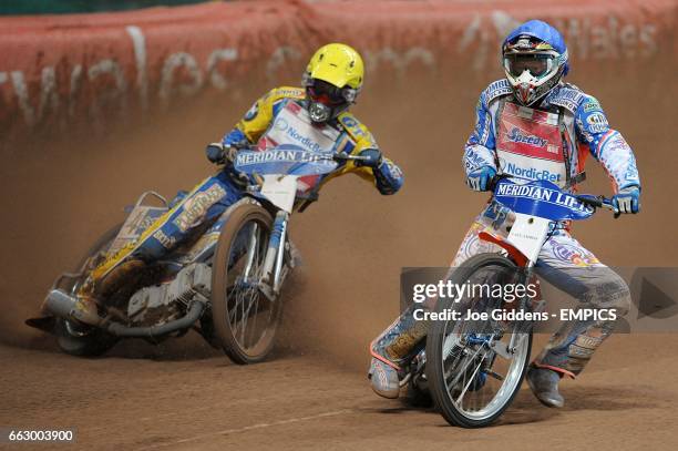 Poland's Tomasz Gollob and Australia's Jason Crump during the FIM British Speedway Grand Prix at the Millennium Stadium.