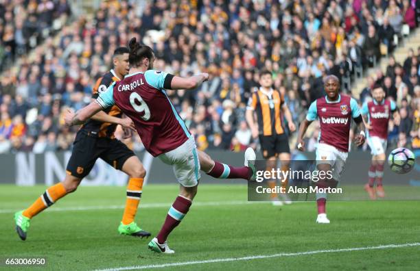 Andy Carroll of West Ham United scores his sides first goal during the Premier League match between Hull City and West Ham United at KCOM Stadium on...