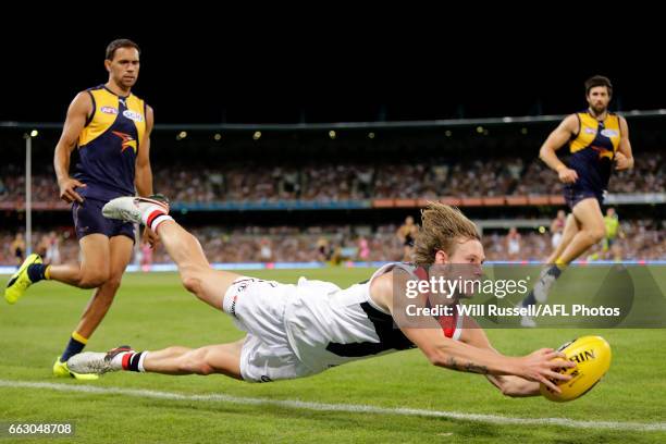 Jimmy Webster of the Saints marks the ball during the round two AFL match between the West Coast Eagles and the St Kilda Saints at Domain Stadium on...