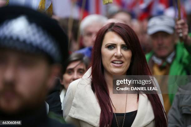 Jayda Fransen, acting leader of the far-right organisation Britain First marches in central London on April 1, 2017. - Members of the Britain First...